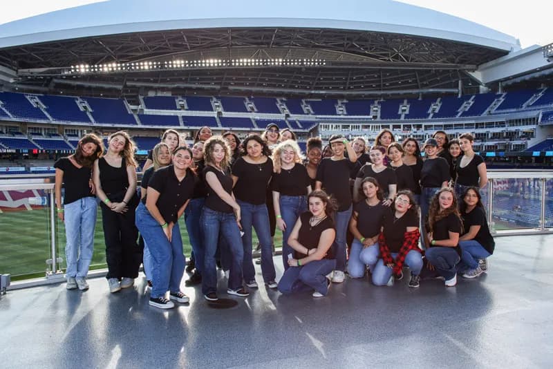 Students at miami marlins stadium after the performance of national anthem